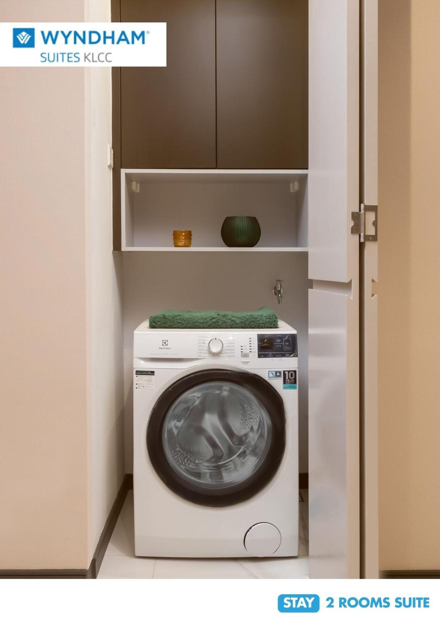 Wyndham Suites Klcc Kuala Lumpur Quarto foto A washing machine